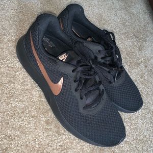 Black and Gold Nike Sneakers